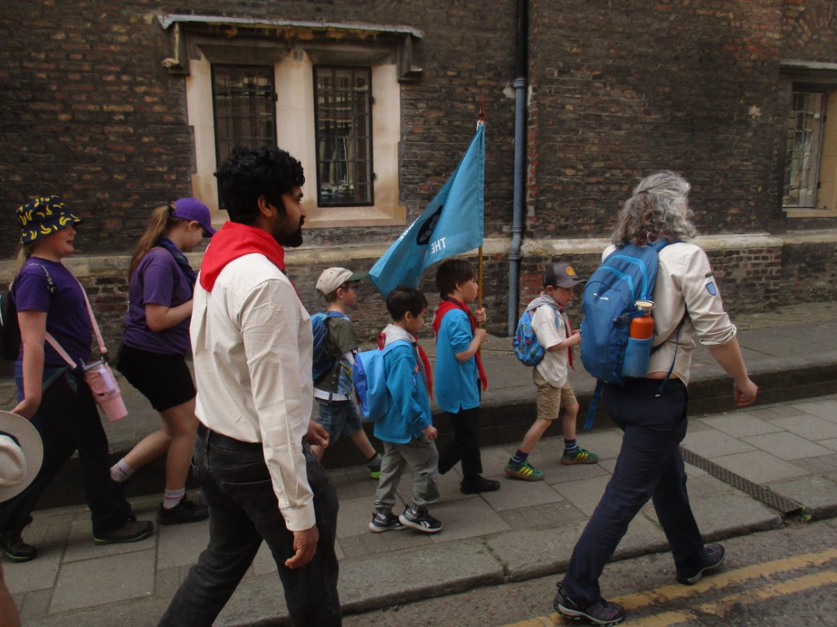 Leaders and young people on parade in Cambridge